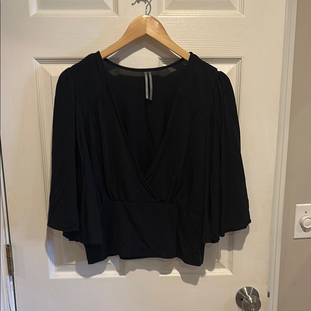 Anthropologie black flutter sleeve top